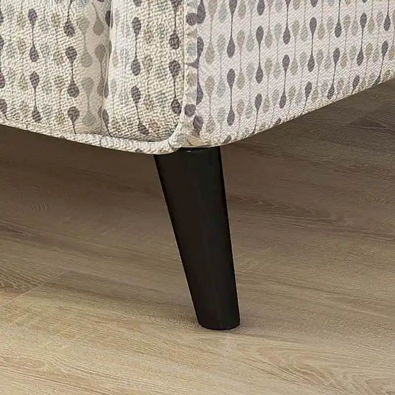 Fauteuil rembourré en tissu multicolore à rayures