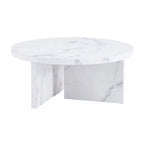 Une table basse ronde en MDF blanc avec motif, adaptée aux petits espaces et aux salons.