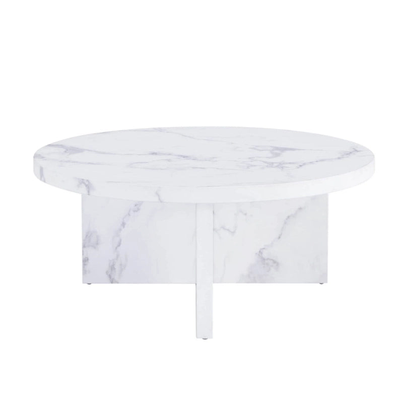 Une table basse ronde en MDF blanc avec motif, adaptée aux petits espaces et aux salons.